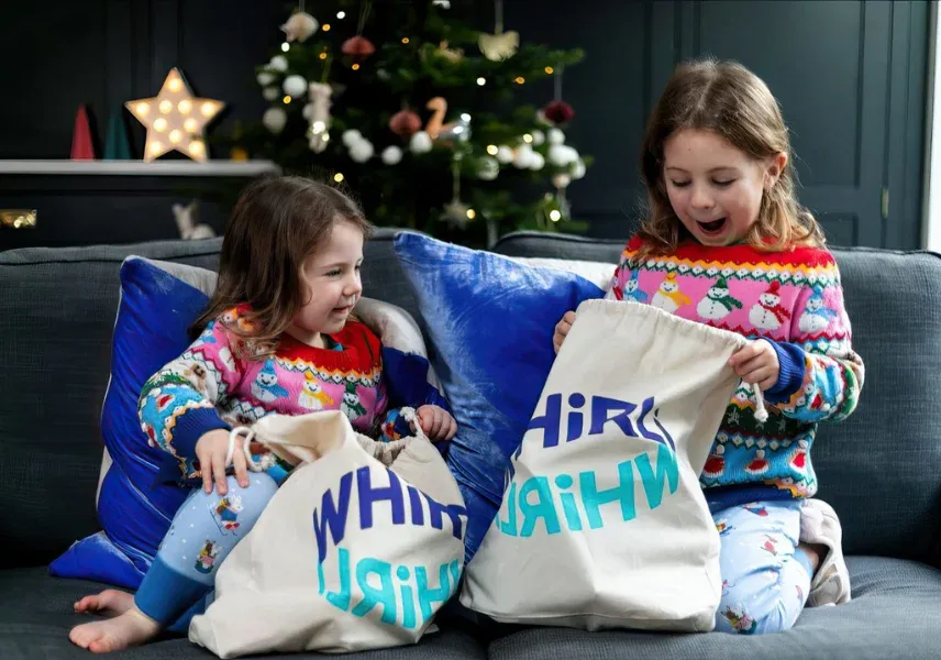 Children with Whirli bags at Christmas